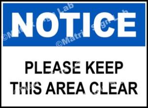 Please Keep This Area Clear Sign