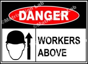 Workers Above Sign